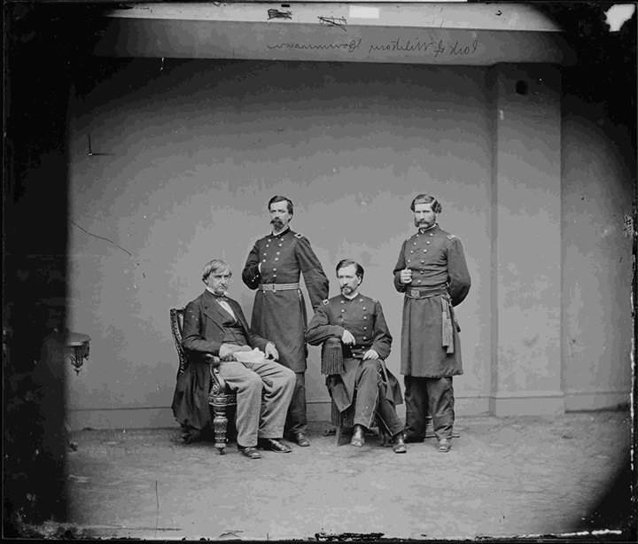 Members of the Lincoln assassination conspiracy military commission. From left to right, Brigadier General Joseph Holt, Brigadier General Robert S. Foster, Colonel Henry L. Burnett, and Lieutenant Colonel David R. Clendenin. (Credit: National Archives and Records Administration)